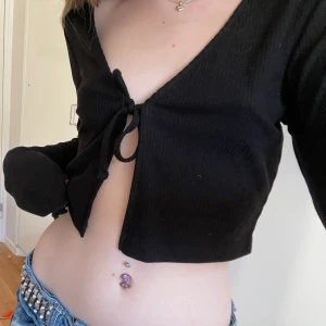 Topp - Kofta / topp som man knyter framtill. 