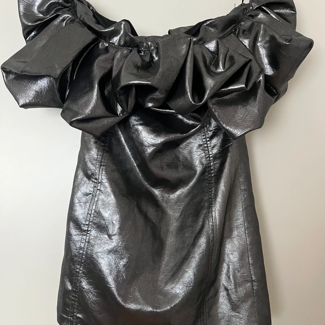 Silvrig off-shoulder topp