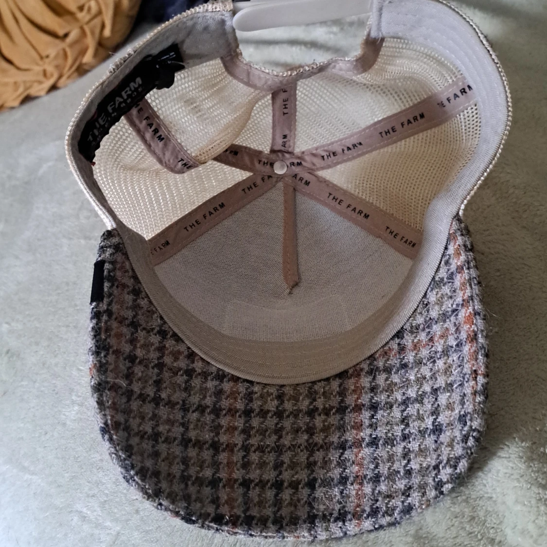 En "The farm" keps, lejon - 91