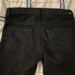 Dior Homme Jeans from hedi Slimane era beautiful distressing all over the jeans for more pictures and measurements come dm, Condition 10/10, straight leg fit. Made in japan denim