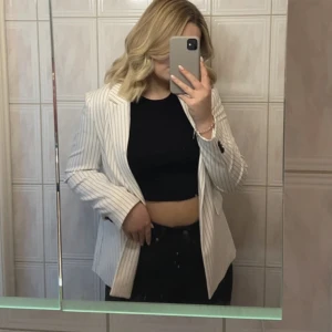 Kavaj - Randig kavaj, endast använd en gång.