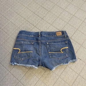 Low shorts american eagle - Vintage american eagle shorts med låg midja storlek 6 mycket fint skick 