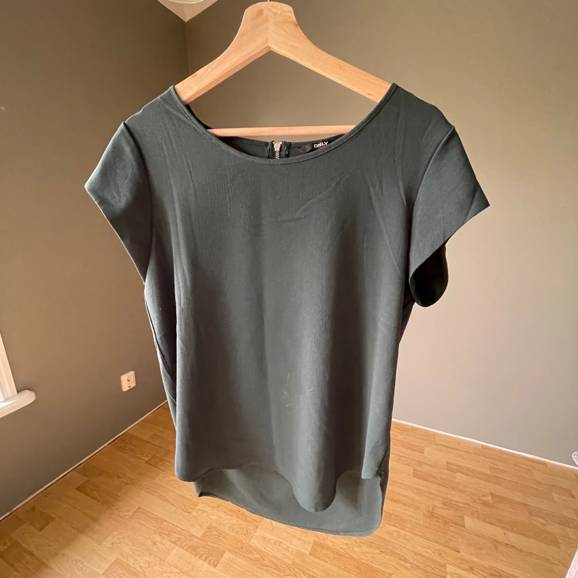 Grön kortärmad blus 