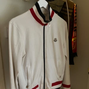 Moncler Cardigan tricolor zip  - 8/10 average condition. 