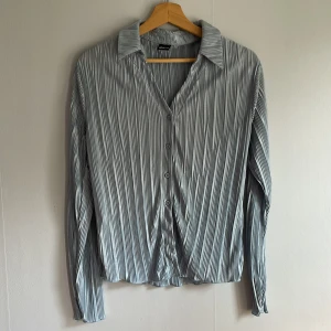 Räfflad skjorta - Sparsamt använd 