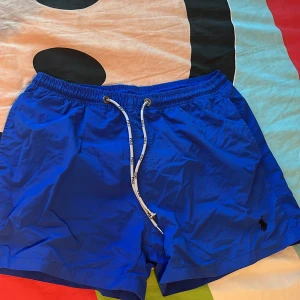 Ralph Lauren badshorts  - Ralph lauren badbyxor i mycket bra skick, använda fåtal gånger, storlek M, billigare vid smidig affär