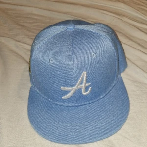 A keps - Kepsen är köpt från capstore och har används ett fåtal ggr