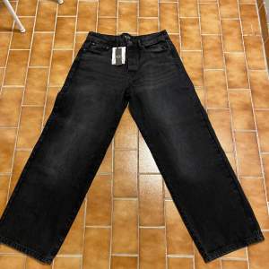Jeans från boohooman med baggy fit Storlek 34R