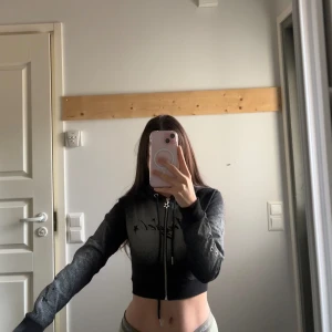 Kofta  - En kort kofta oanvänd 