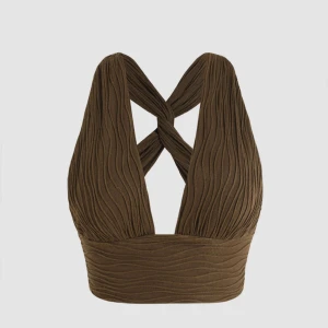 Halter topp - Aldrig använd, lite liten i storleken 