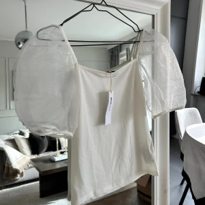 Helt ny puffärmstopp - Lappen kvar, aldrig använd 