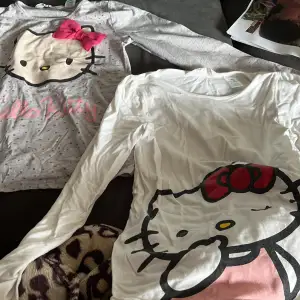 Säljer 2 pack  långärmade hello Kitty  tröjor som är i använt fräscht skick. 