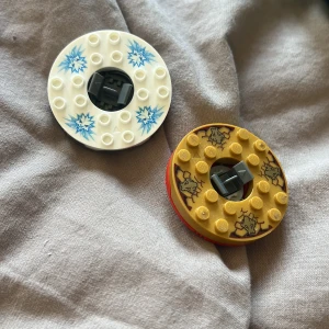 2 Lego Ninjago spinitzu spinners - Båda för 40. Zane och Coles spinners