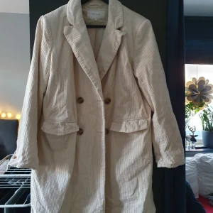 Jacka - Oanvänd vårkappa