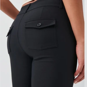 Bootcut byxor - Byxor från ginatricot oanvänd 