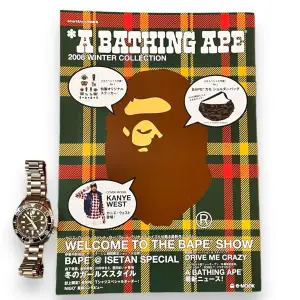 BAPE Magazine Book from 2009  72 pages of crazy lookbook collections showing products from the season, full sticker pack. Watchfor reference on how big the book is. Super cool accessory for anyone that loves Bape. These are a very interesting read!  
