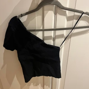 Svart topp - Aldrig använd