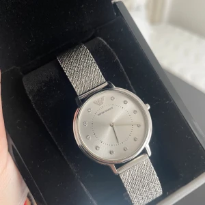 Klocka Armani - Snygg klocka säljes då jag inte använder den. 