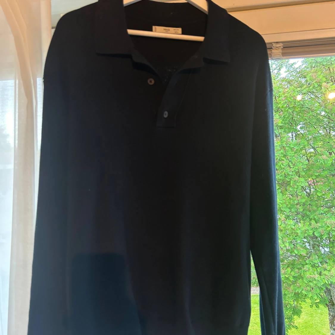 Stickad tröja, mango