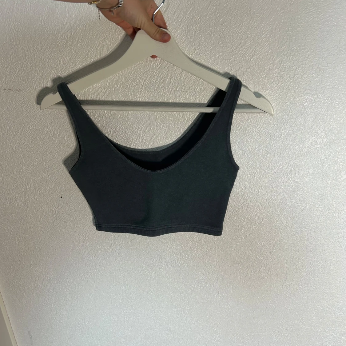 Svart ärmlös linnetopp - 90