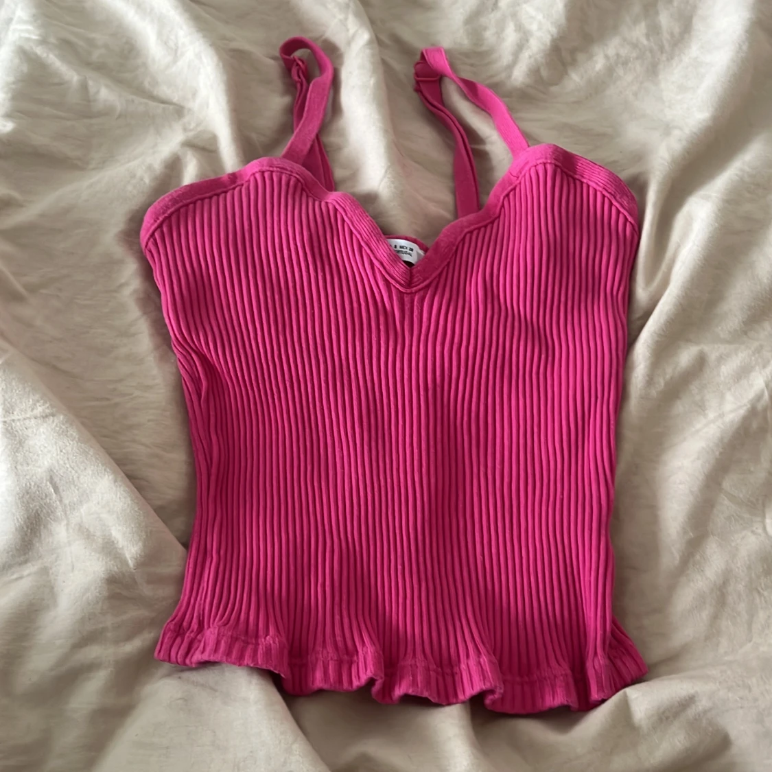 Rosa ribbad linnetopp från Zara