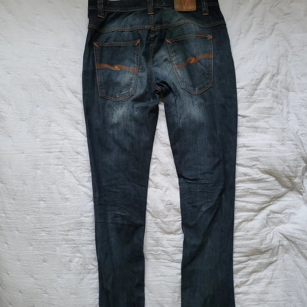 Jeans av märket Nudie Jeans Herr. Jeans & Byxor.