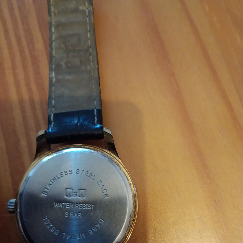 Klocka Q&Q Quartz IPG Water resist 3 Bar med rem.nytt batteri alt rem behövs.. Asusteet.