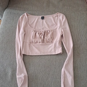 Top - A cropped tshirt that is for winter.  Elegant and never worn. 