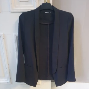 Tunn kavaj - Tunn kavaj utan knäppning