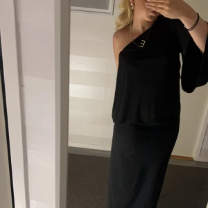 Osymmetrisk topp - En osymmetrisk topp som går att klä upp och ned.