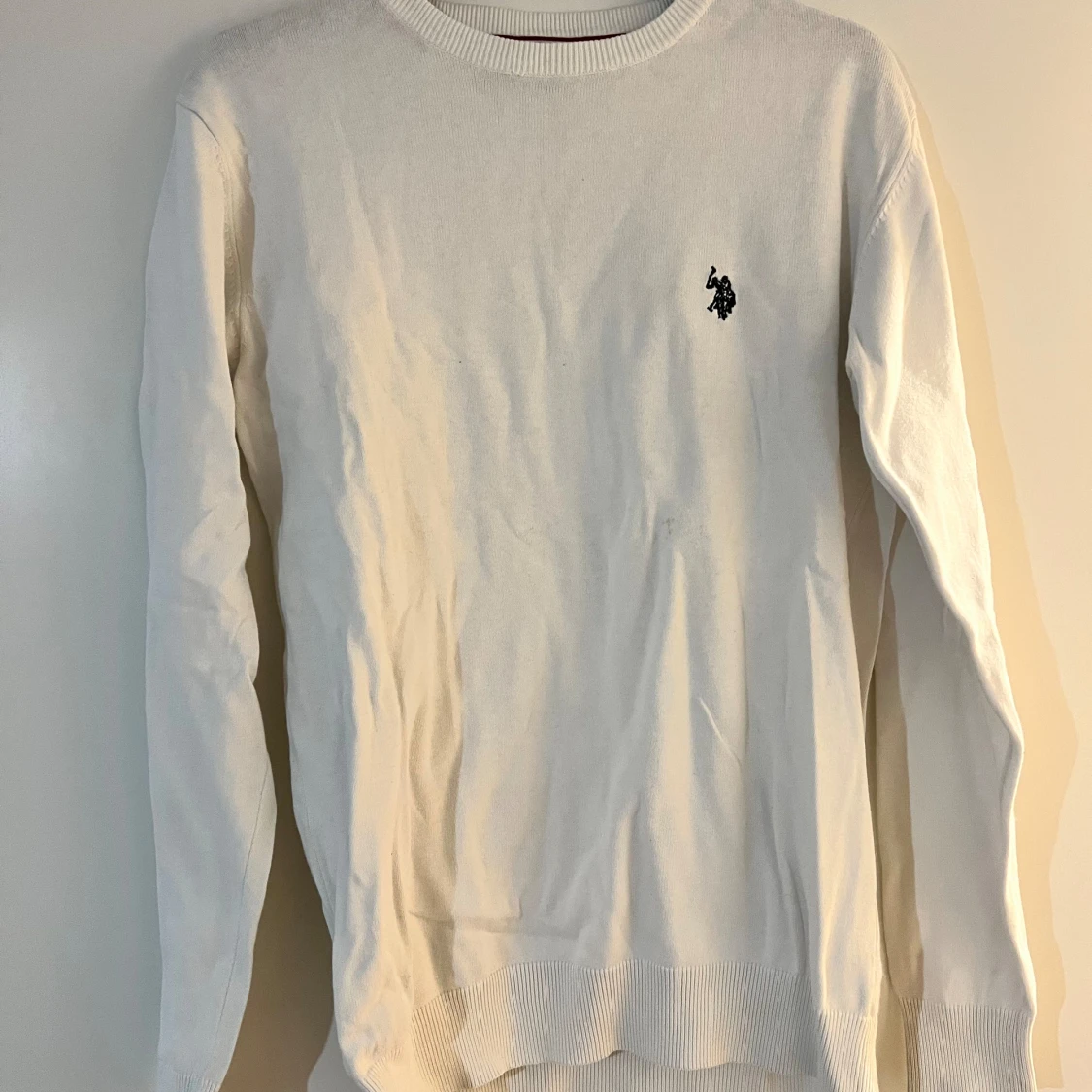 Lång armad polo tröja