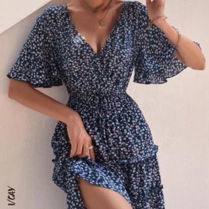 Blommig klänning  - Fint skick