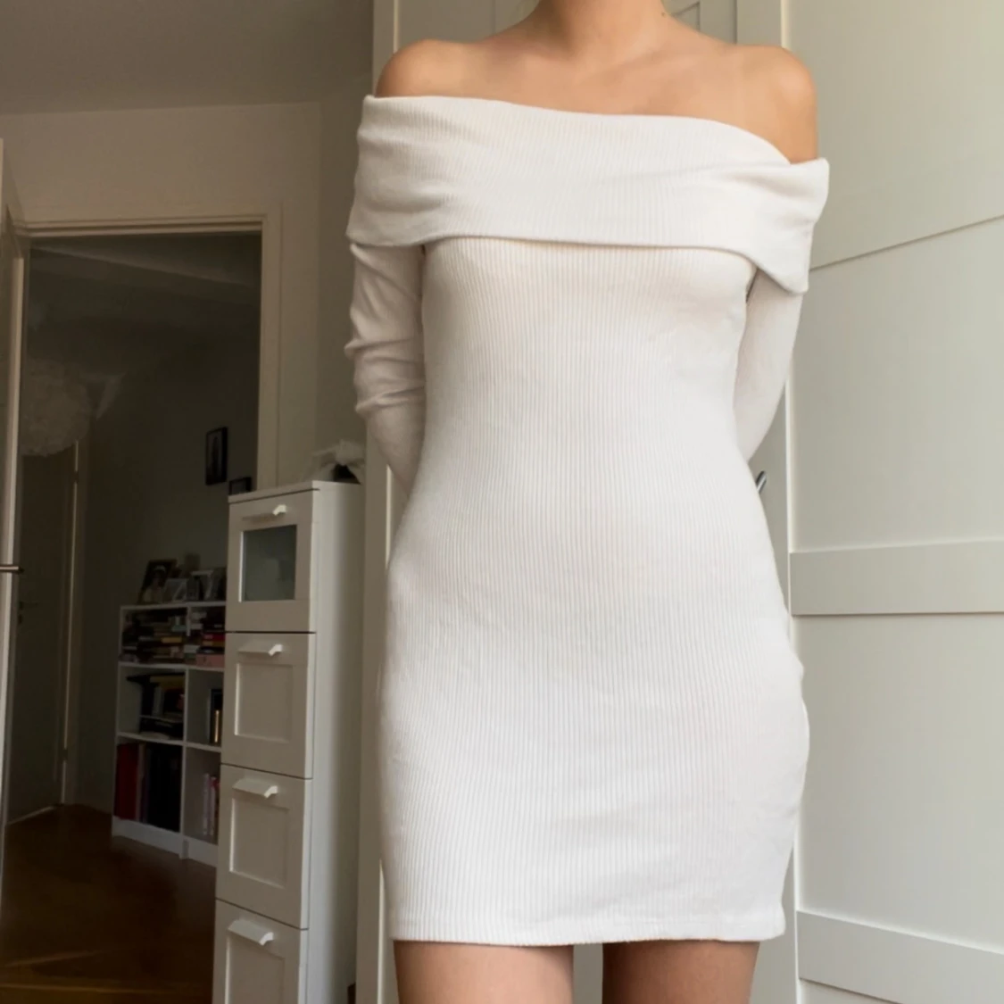 Ljusrosa off-shoulder klänning