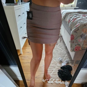 Kjol - Skitsnygg kjol från Nelly med lapp kvar