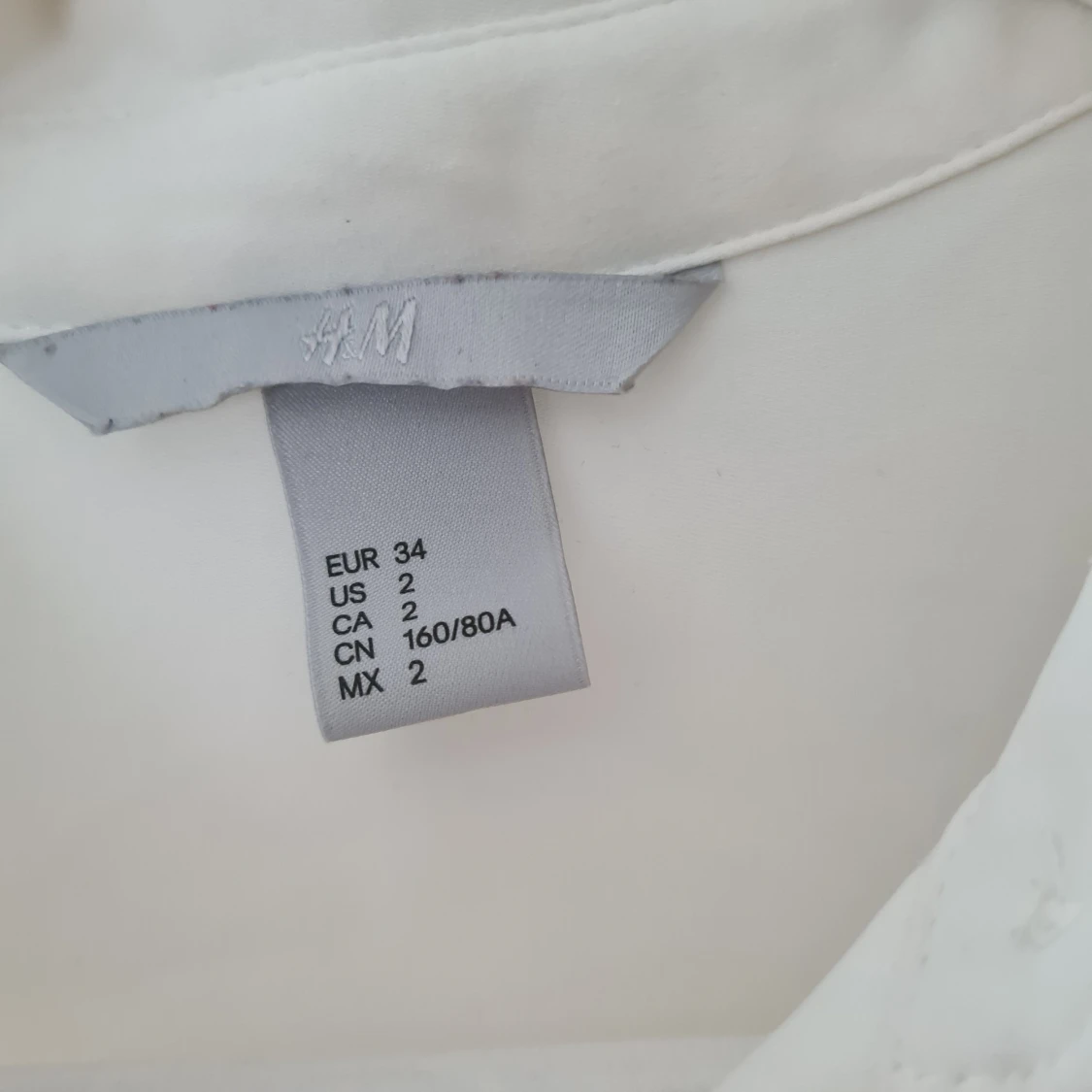 Fin blus med pärlor - 90