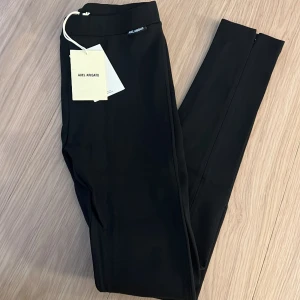 Axel Arigatohigh-waisted side-zip leggings - Axel Arigato high-waisted side-zip leggings i stl S 