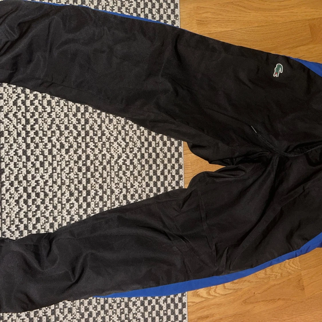 Svarta träningsbyxor från Lacoste Sport - 91