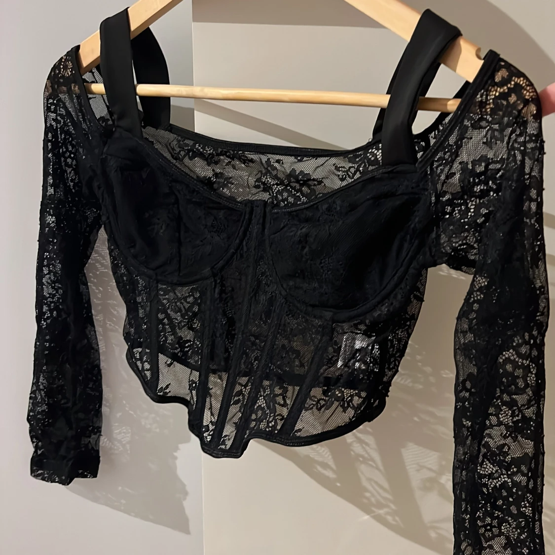 Svart spetskorsett
