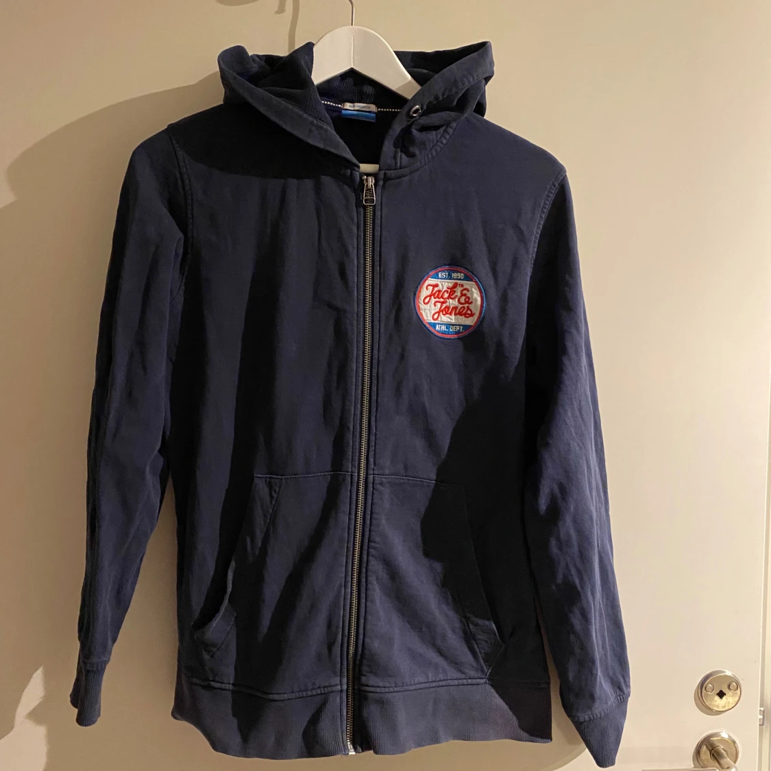 Blå huvtröja med dragkedja