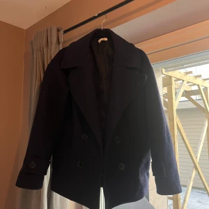 Jacka  - Passar storlek xs och s Mörkblå