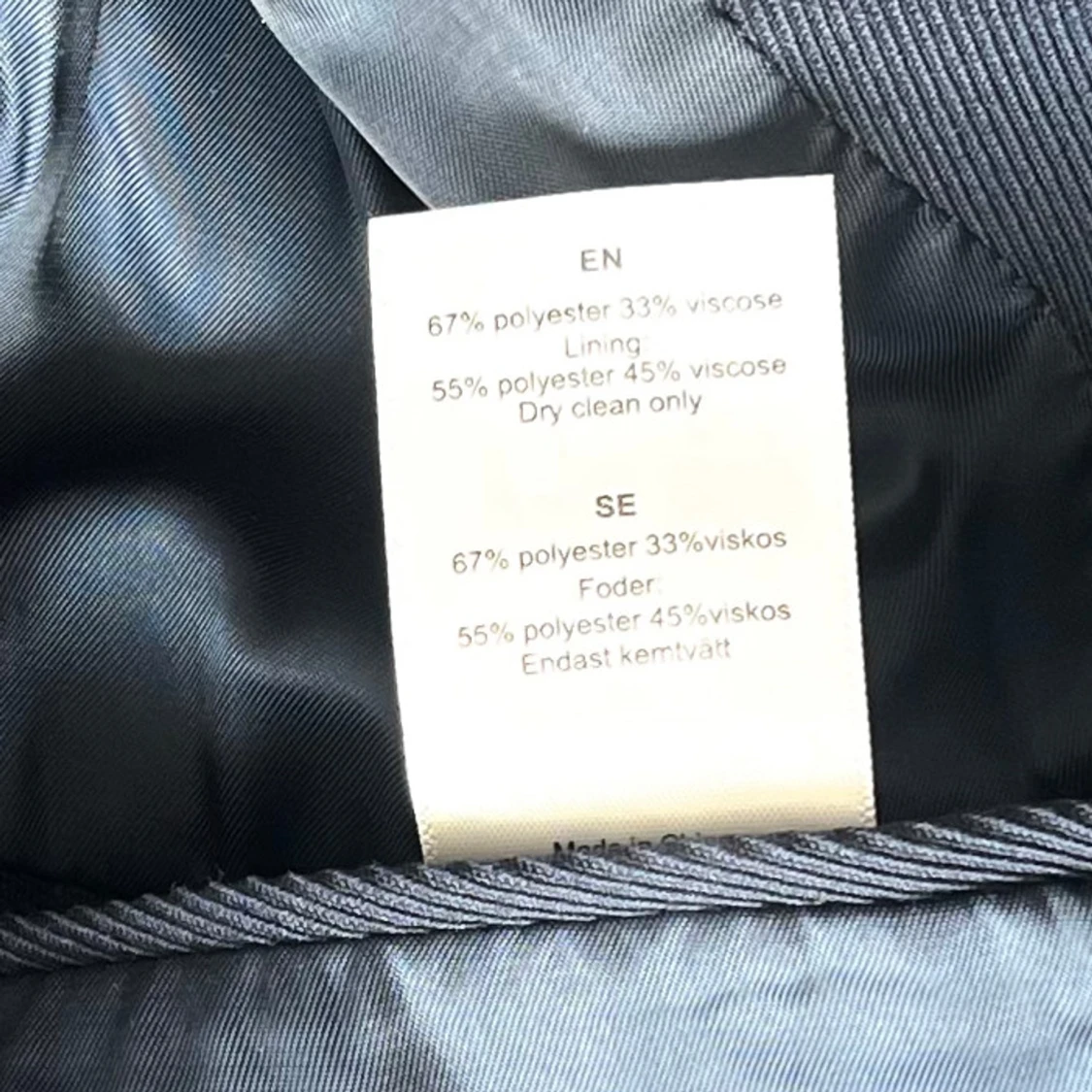 Mörkblå kappa från Stockh lm - 91