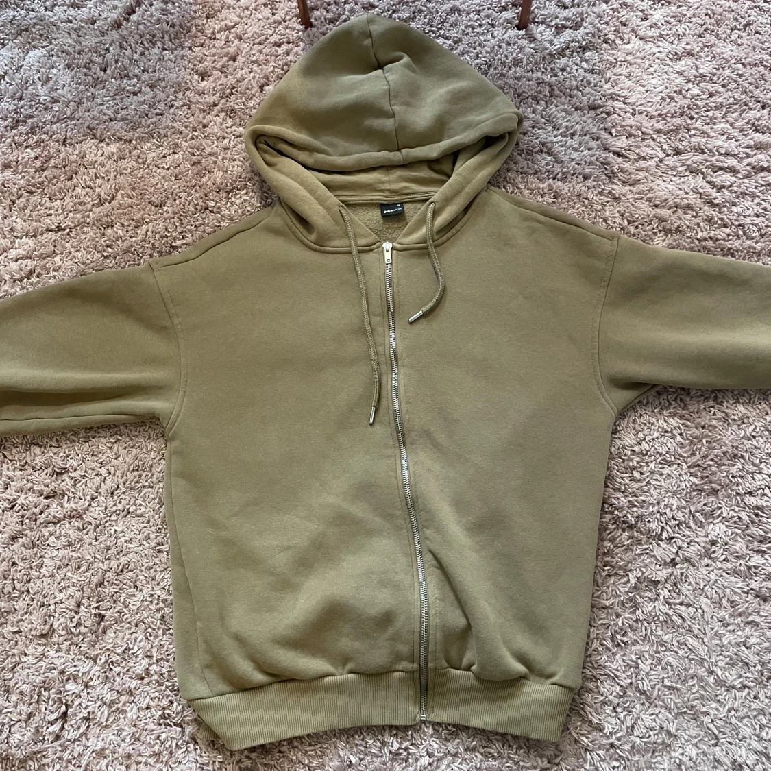 Olivfärgad hoodie