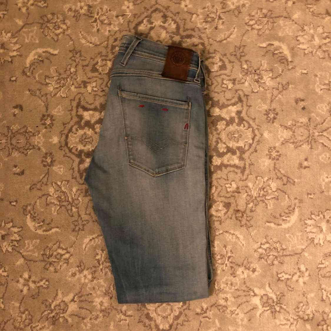 Ljusblåa Replay Anbass Jeans