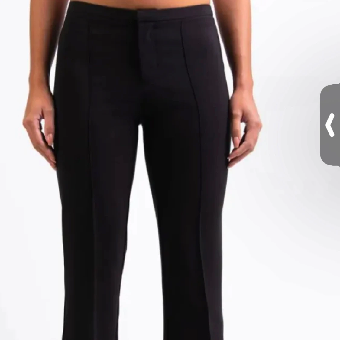 Svarta kostymbyxor