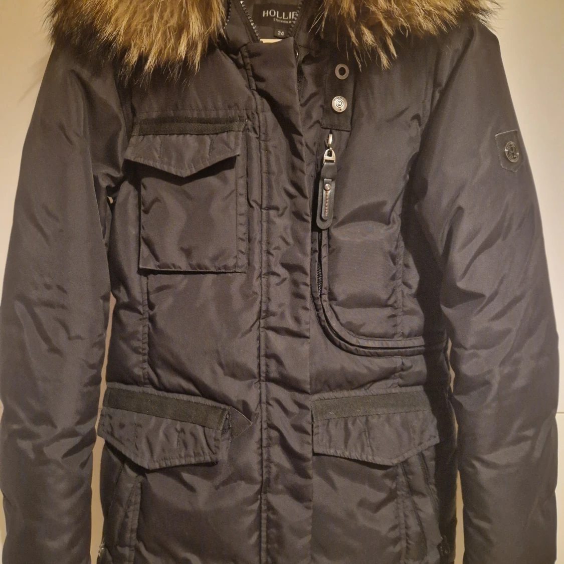 Svart Livigno från Hollies med äkta päls strl 34 - 90