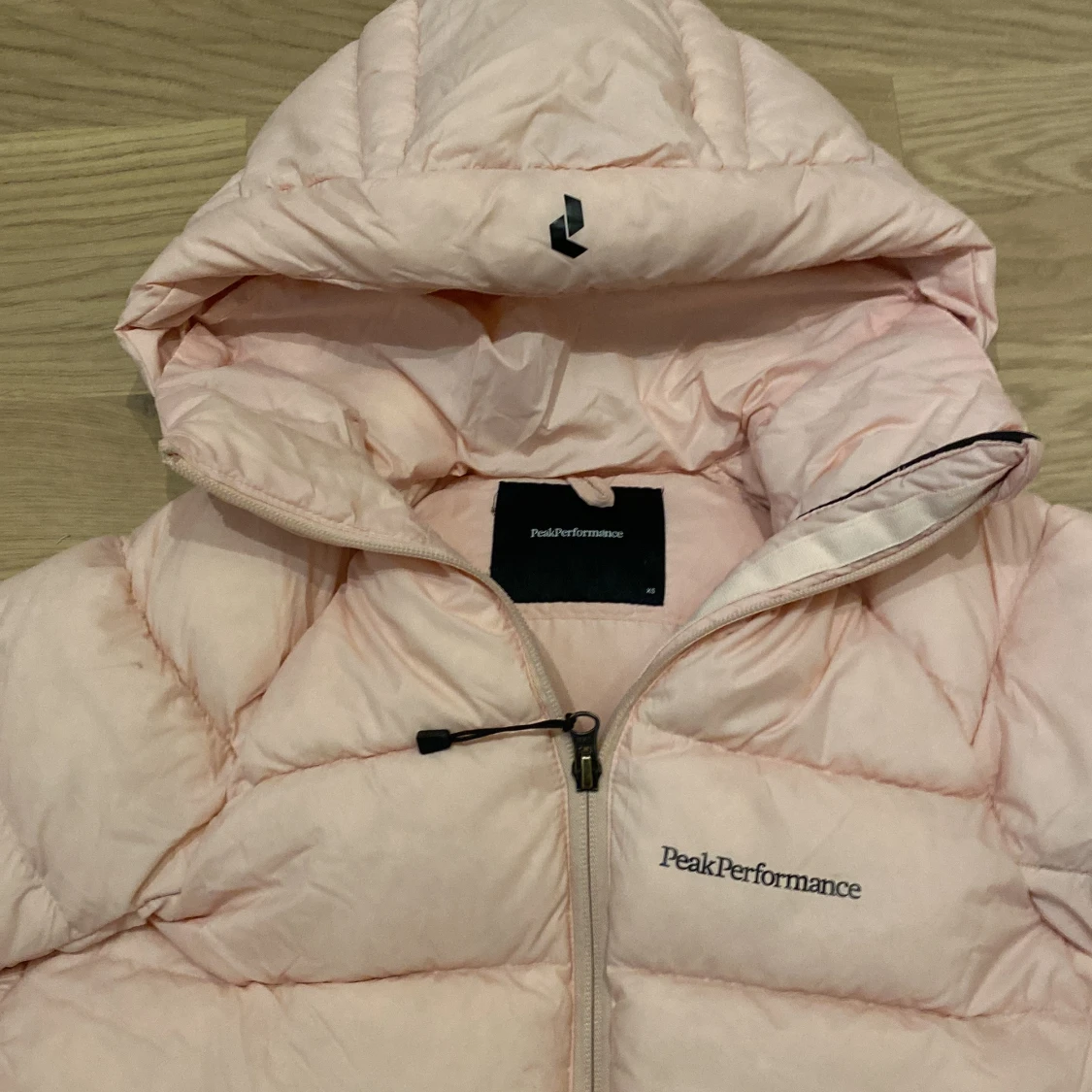 Ljusrosa dunjacka från Peak Performance - 91