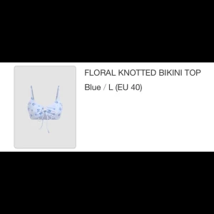 Bikiniöverdel oanvänd - Säljer en superfin blå bikiniöverdel med blommigt mönster och knytning framtill. Toppen är i storlek L (EU 40) .🌸💙