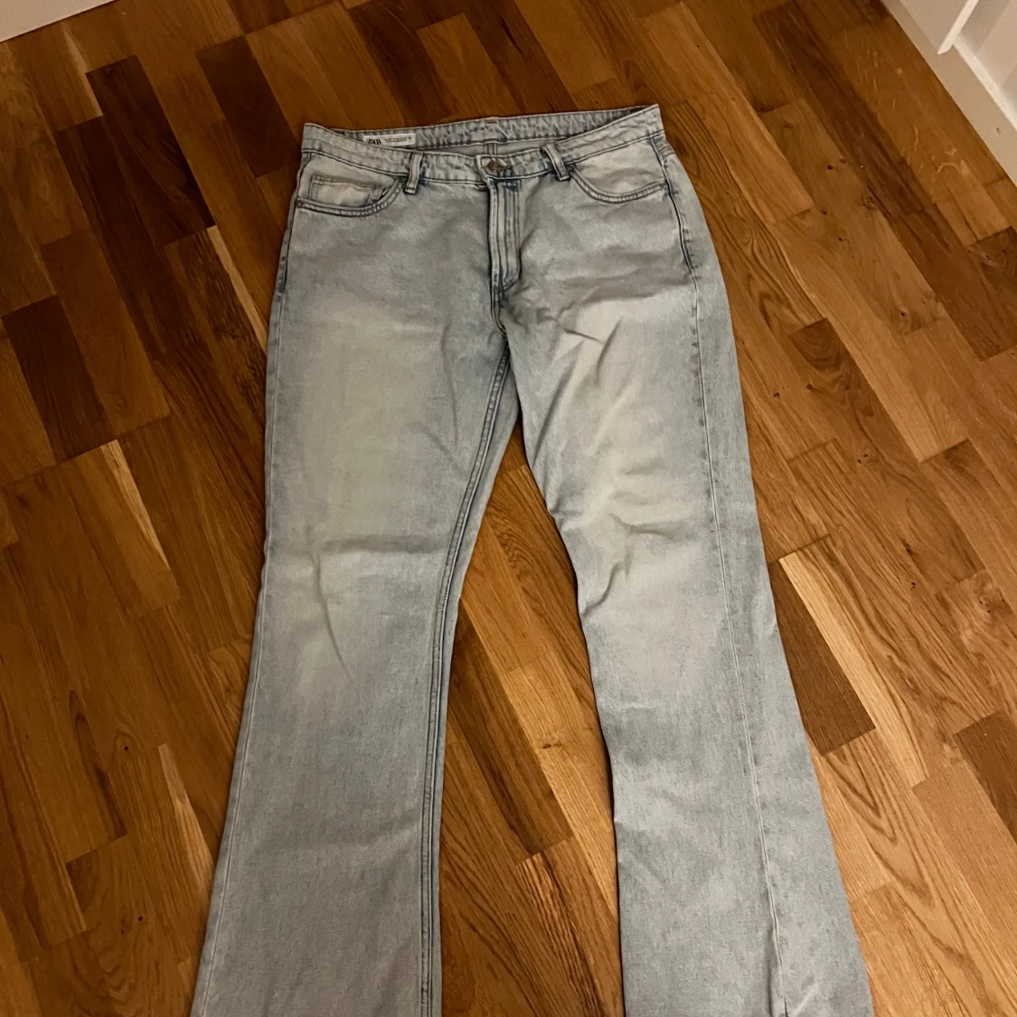 Ljusblå bootcut jeans - 90
