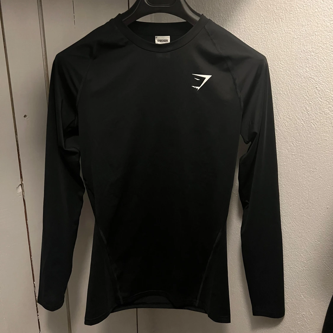 Svart compression tröja