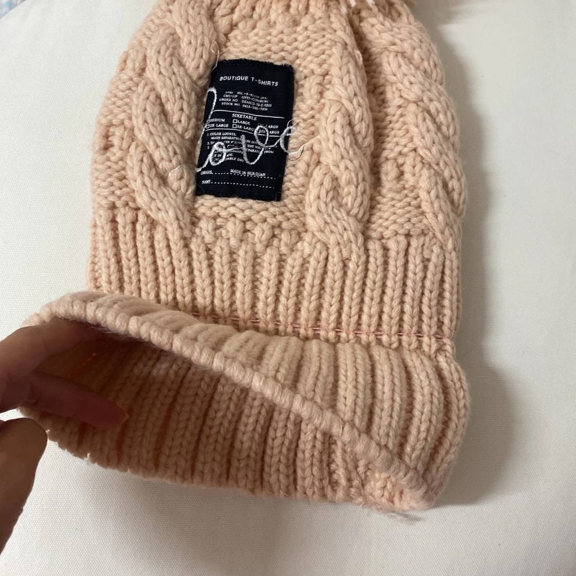 Beige/rosa stickad mössa med tofs - 92